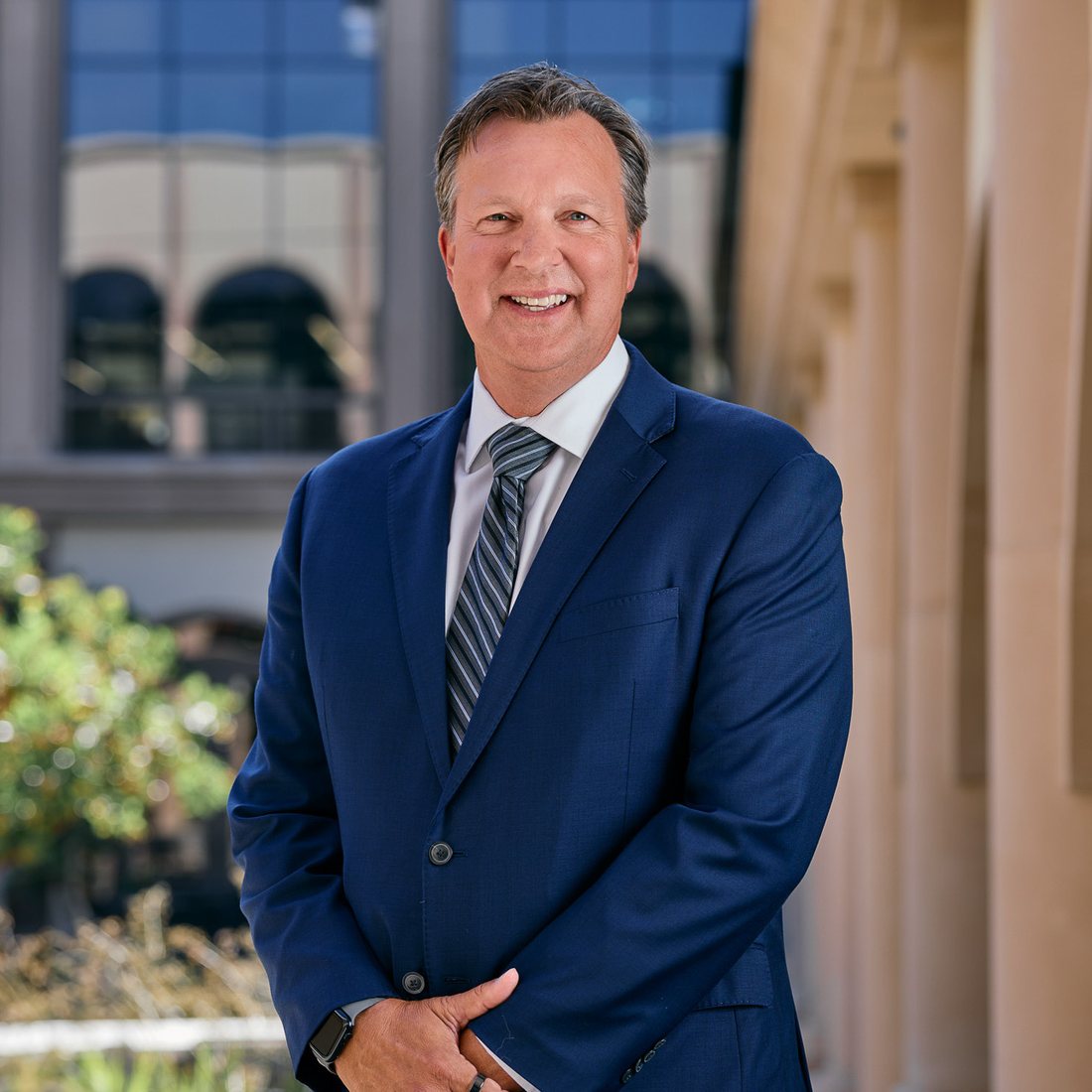 Brian Tietje, Dean of the Knauss School of Business at the University of San Diego, standing outside the business school.